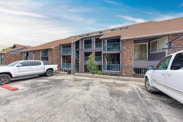 1840 Burton Dr Unit 102, Austin, TX 78741 - view of building exterior with uncovered parking