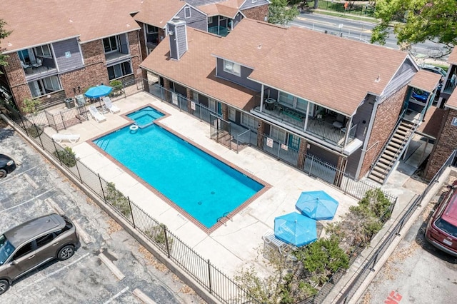1840 Burton Dr Unit 102, Austin, TX 78741 - view of pool featuring a pool with connected hot tub and a patio