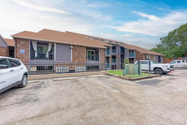 1840 Burton Dr Unit 102, Austin, TX 78741 - view of property with uncovered parking