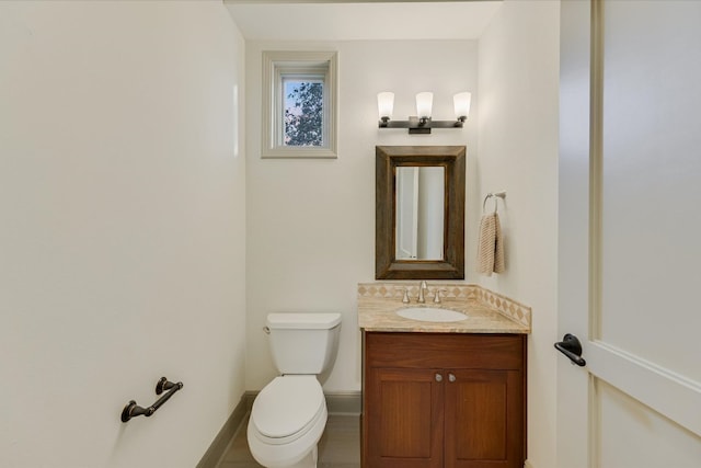 1101 Sprague Ln, West Lake Hills, TX 78746 - half bathroom featuring vanity, toilet, and baseboards