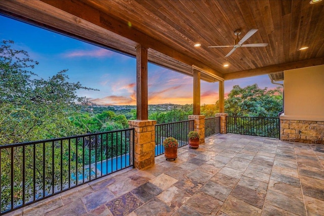 1101 Sprague Ln, West Lake Hills, TX 78746 - patio terrace at dusk with a ceiling fan and a balcony