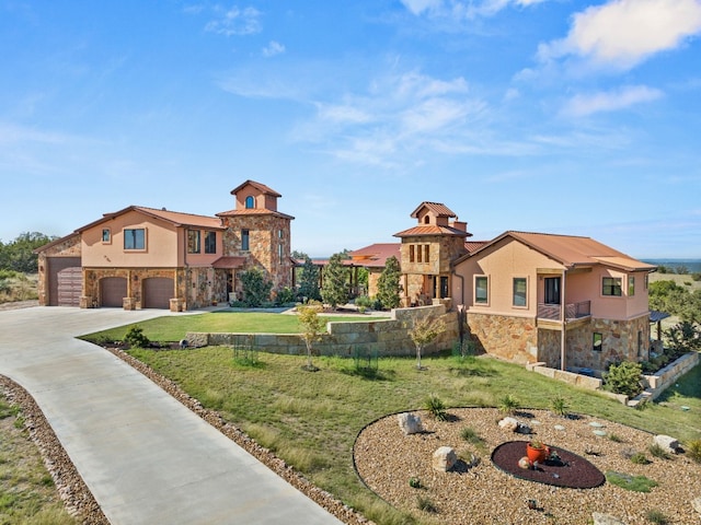 281 Cedar Mountain Dr, Marble Falls, TX 78654 - view of front of property featuring stone siding, stucco siding, driveway, and a front lawn