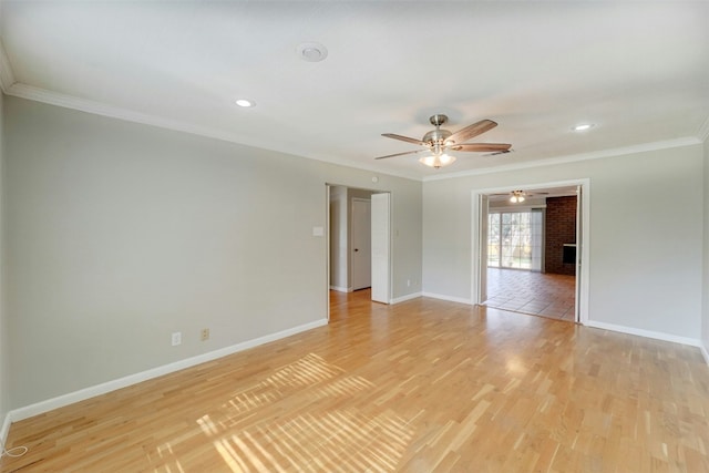 4020 Far W Blvd, Austin, TX 78731 - empty room with crown molding, baseboards, ceiling fan, light wood finished floors, and recessed lighting