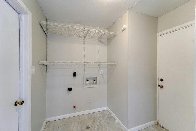 4020 Far W Blvd, Austin, TX 78731 - washroom with gas dryer hookup, baseboards, washer hookup, and light marble finish flooring