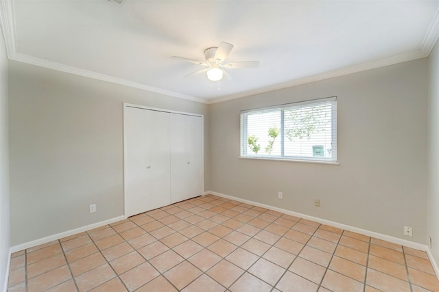 4020 Far W Blvd, Austin, TX 78731 - unfurnished bedroom with ornamental molding, a closet, a ceiling fan, and light tile patterned floors