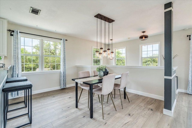 8204 Williamson Creek Dr, Austin, TX 78736 - dining room with light wood-style floors and baseboards