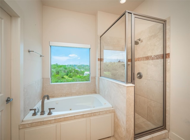 14410 Hunters Pass, Austin, TX 78734 - bathroom featuring a shower stall and a whirlpool tub