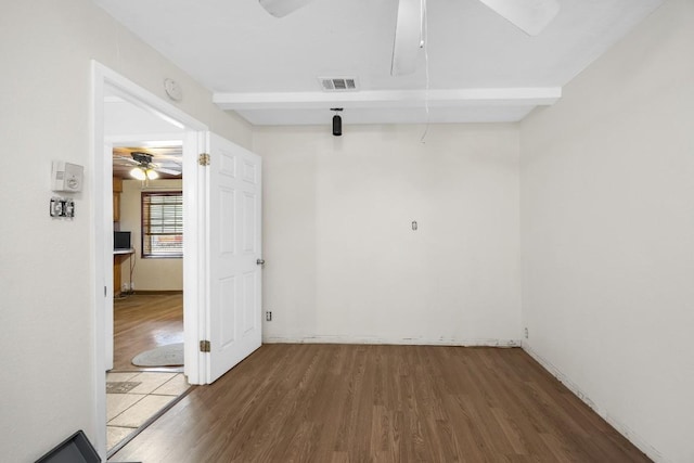 217 S Wilson St, San Marcos, TX 78666 - empty room featuring ceiling fan, wood finished floors, and a smoke detector