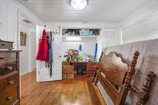 217 S Wilson St, San Marcos, TX 78666 - bedroom with wood-type flooring