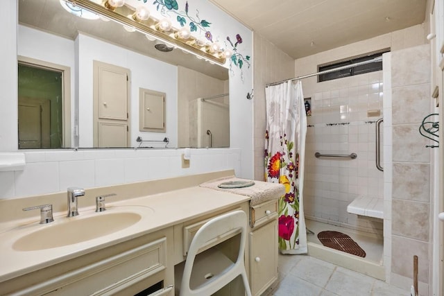217 S Wilson St, San Marcos, TX 78666 - full bathroom featuring a shower stall, vanity, and tile patterned floors
