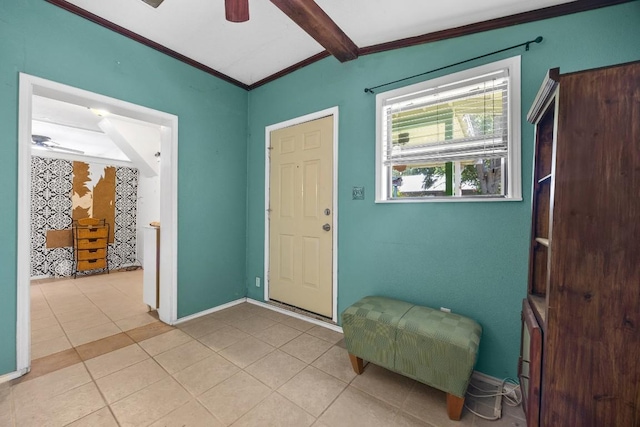 217 S Wilson St, San Marcos, TX 78666 - entrance foyer featuring ceiling fan, crown molding, and light tile patterned flooring