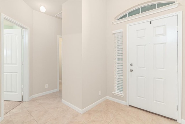 466 Sand Trl, New Braunfels, TX 78130 - entryway with light tile patterned floors and baseboards