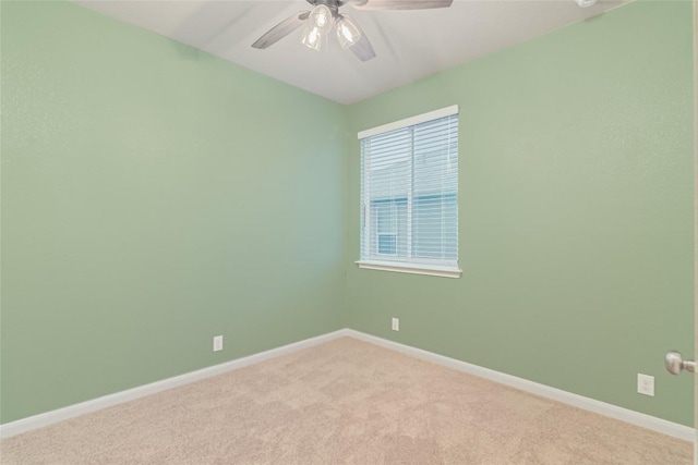 466 Sand Trl, New Braunfels, TX 78130 - spare room with a ceiling fan, light colored carpet, and baseboards