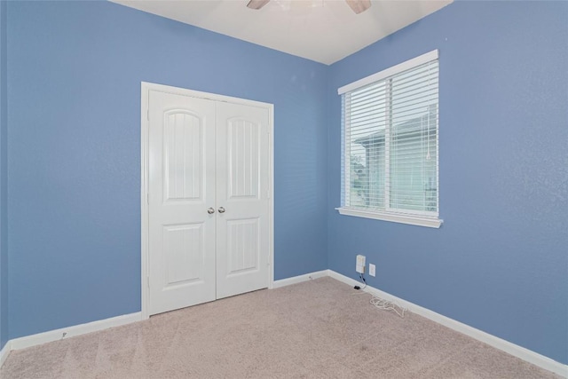 466 Sand Trl, New Braunfels, TX 78130 - unfurnished bedroom with a closet, carpet floors, baseboards, and ceiling fan