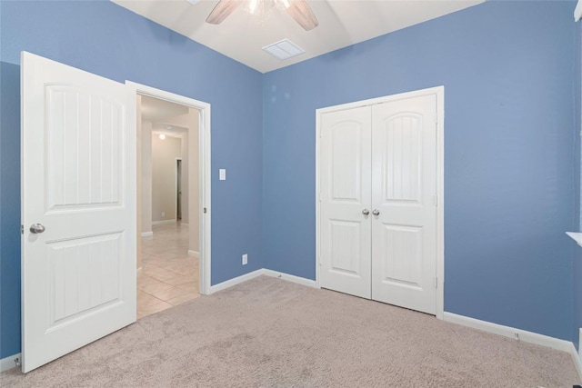 466 Sand Trl, New Braunfels, TX 78130 - unfurnished bedroom with carpet floors, a closet, baseboards, and a ceiling fan