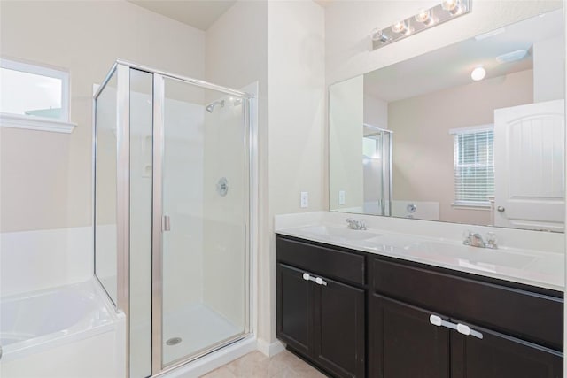466 Sand Trl, New Braunfels, TX 78130 - bathroom featuring a shower stall, a bath, double vanity, and tile patterned floors