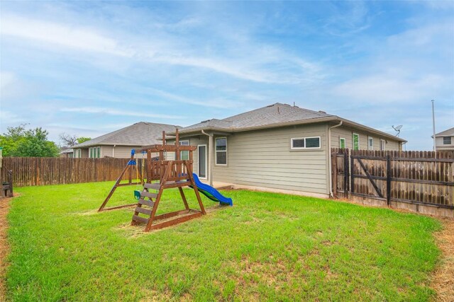 466 Sand Trl, New Braunfels, TX 78130 - rear view of property featuring a playground