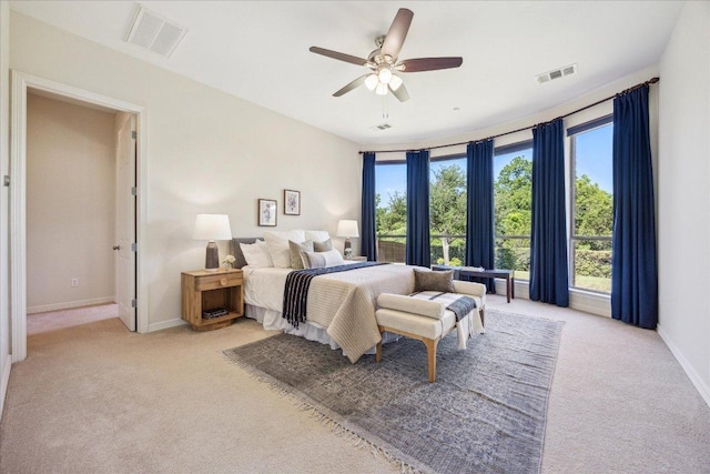331 Littleton Dr, Austin, TX 78737 - bedroom with light colored carpet and a ceiling fan