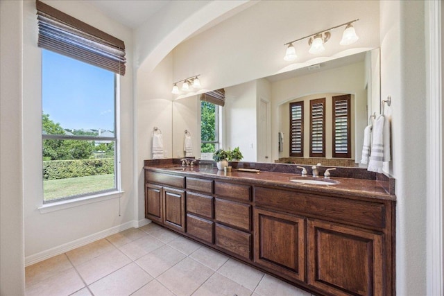 331 Littleton Dr, Austin, TX 78737 - bathroom with double vanity and tile patterned floors