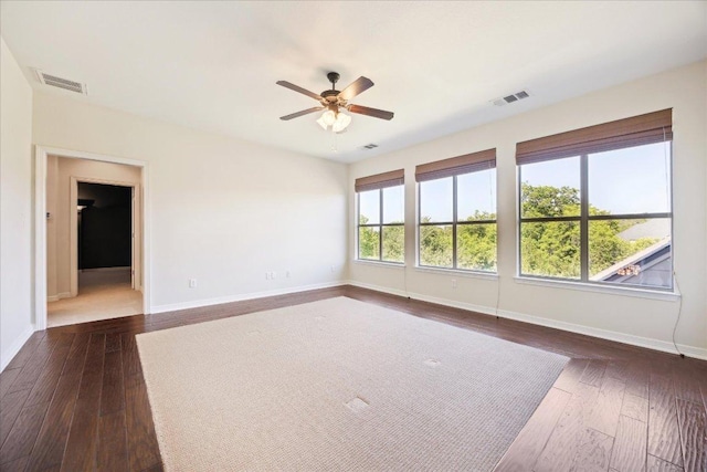 331 Littleton Dr, Austin, TX 78737 - spare room with baseboards, ceiling fan, and dark wood-style flooring