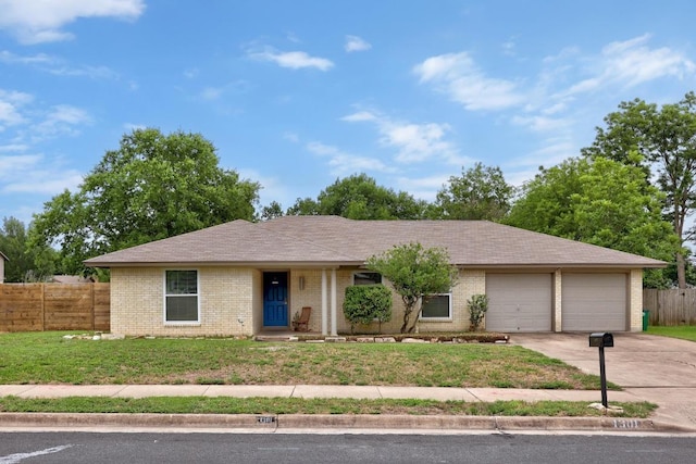 1301 S Meadows Dr, Austin, TX 78758 - ranch-style house with concrete driveway, an attached garage, and brick siding