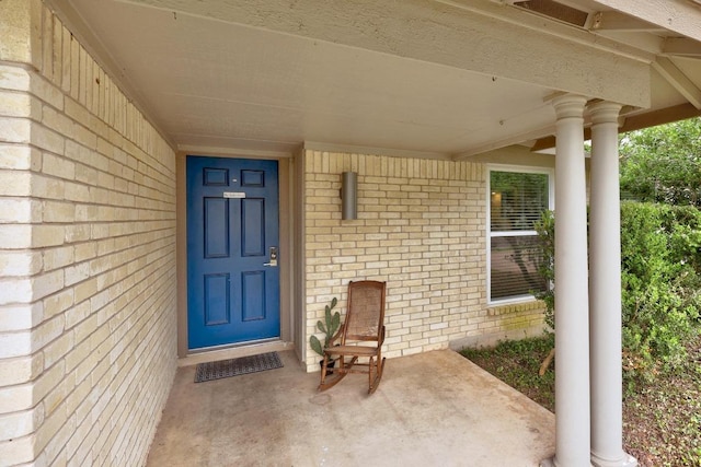 1301 S Meadows Dr, Austin, TX 78758 - entrance to property with brick siding