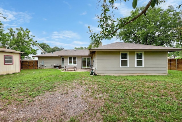 1301 S Meadows Dr, Austin, TX 78758 - rear view of property featuring a patio