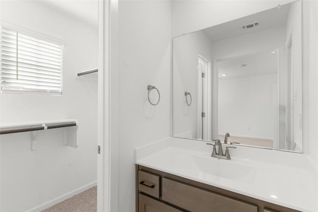 2705 Sage Ranch Dr Unit 20, Leander, TX 78641 - bathroom featuring vanity and baseboards