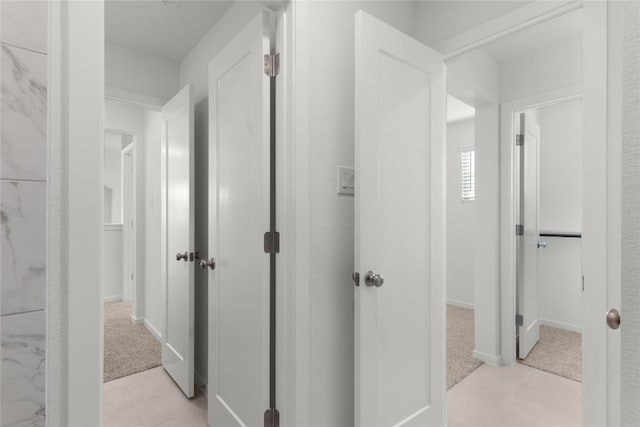 2705 Sage Ranch Dr Unit 20, Leander, TX 78641 - corridor featuring light colored carpet and light tile patterned floors
