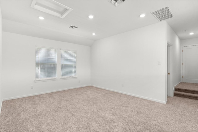2705 Sage Ranch Dr Unit 20, Leander, TX 78641 - spare room with attic access, light carpet, and recessed lighting
