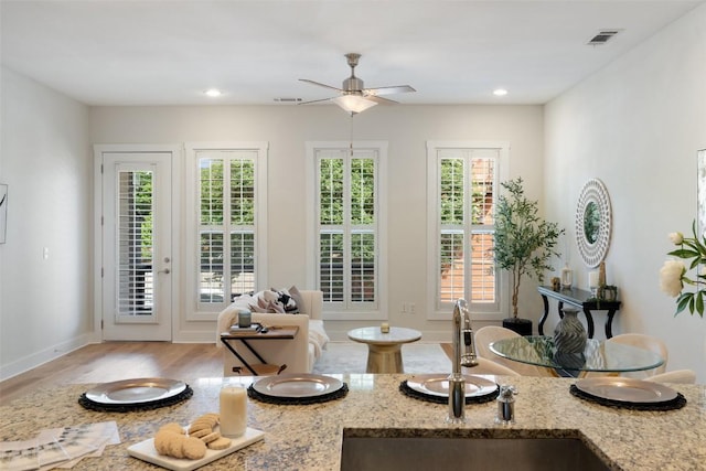 2520 Bluebonnet Ln Unit 58, Austin, TX 78704 - sitting room with wood finished floors, a ceiling fan, and recessed lighting
