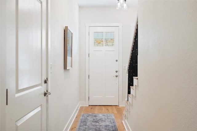 2520 Bluebonnet Ln Unit 58, Austin, TX 78704 - doorway with light wood-style flooring and baseboards