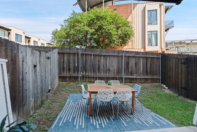 2520 Bluebonnet Ln Unit 58, Austin, TX 78704 - fenced backyard with outdoor dining space
