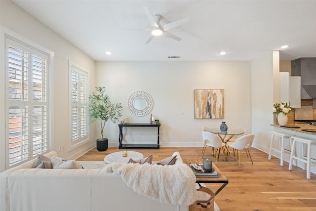 2520 Bluebonnet Ln Unit 58, Austin, TX 78704 - living room with ceiling fan, recessed lighting, and light wood-style floors