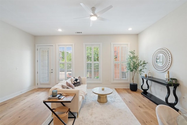 2520 Bluebonnet Ln Unit 58, Austin, TX 78704 - living area with light wood finished floors, ceiling fan, and recessed lighting