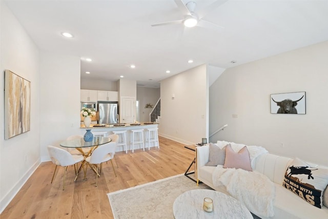 2520 Bluebonnet Ln Unit 58, Austin, TX 78704 - living area with light wood-style floors, recessed lighting, stairs, and a ceiling fan