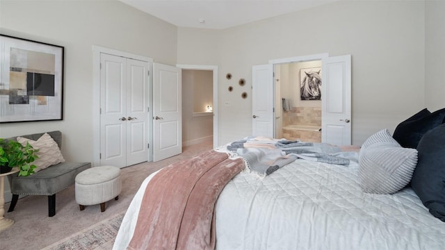 2520 Bluebonnet Ln Unit 58, Austin, TX 78704 - bedroom featuring light carpet, ensuite bath, and a closet
