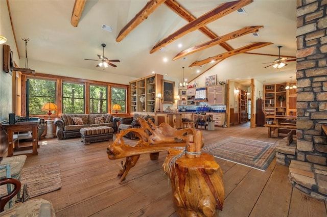 136 Red Fox Ln, Bastrop, TX 78602 - living room with ceiling fan, beam ceiling, light wood finished floors, and high vaulted ceiling