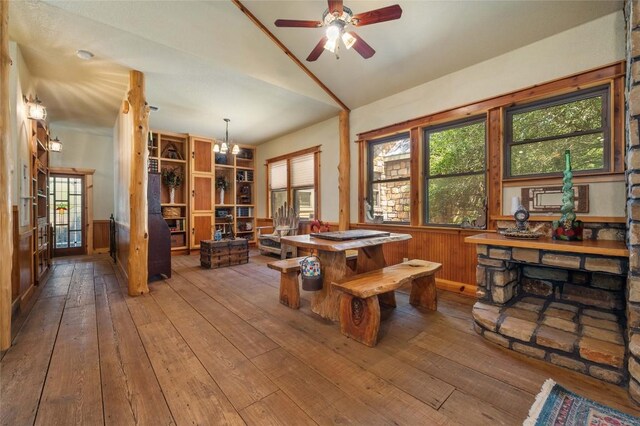 136 Red Fox Ln, Bastrop, TX 78602 - recreation room featuring lofted ceiling, hardwood / wood-style flooring, a ceiling fan, a chandelier, and wainscoting