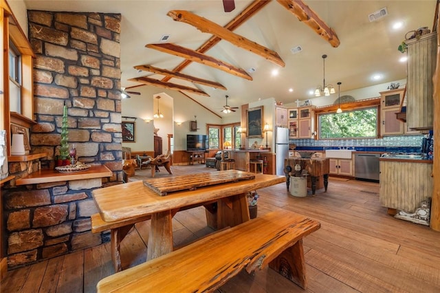 136 Red Fox Ln, Bastrop, TX 78602 - dining room featuring beam ceiling, light wood-type flooring, high vaulted ceiling, a ceiling fan, and recessed lighting