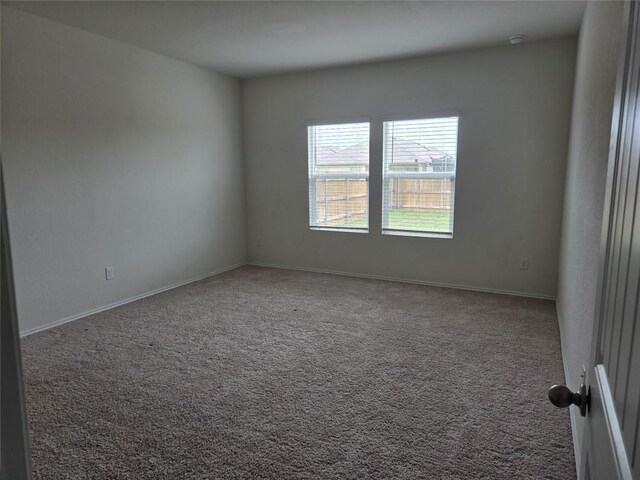 12324 Token Trl, Elgin, TX 78621 - carpeted empty room with baseboards