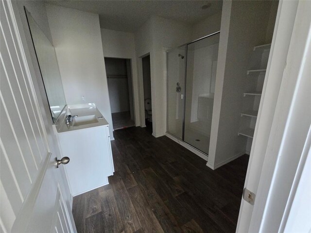 12324 Token Trl, Elgin, TX 78621 - full bath with vanity, a stall shower, and wood finished floors