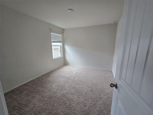 12324 Token Trl, Elgin, TX 78621 - carpeted empty room with baseboards