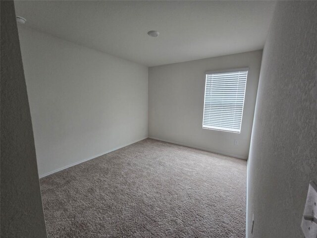 12324 Token Trl, Elgin, TX 78621 - empty room featuring carpet flooring