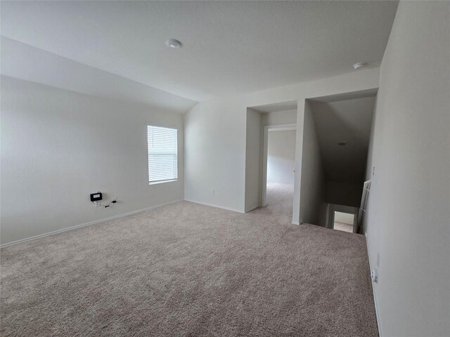12324 Token Trl, Elgin, TX 78621 - spare room featuring carpet flooring, baseboards, and a smoke detector