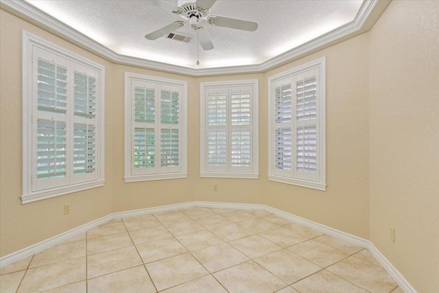 1204 Fairway Cir, Salado, TX 76571 - spare room featuring tile patterned floors, a ceiling fan, and a textured ceiling