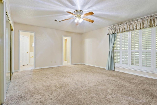 1204 Fairway Cir, Salado, TX 76571 - empty room featuring carpet flooring, ceiling fan, and a textured ceiling