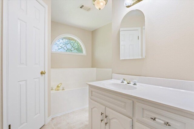 1204 Fairway Cir, Salado, TX 76571 - bathroom featuring vanity and a bath