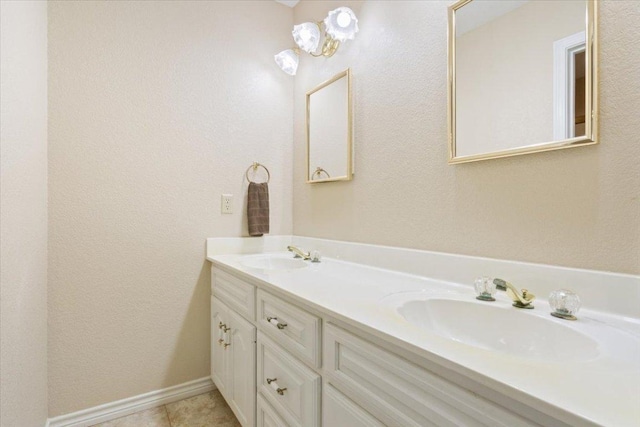 1204 Fairway Cir, Salado, TX 76571 - full bath with double vanity, a textured wall, and tile patterned flooring