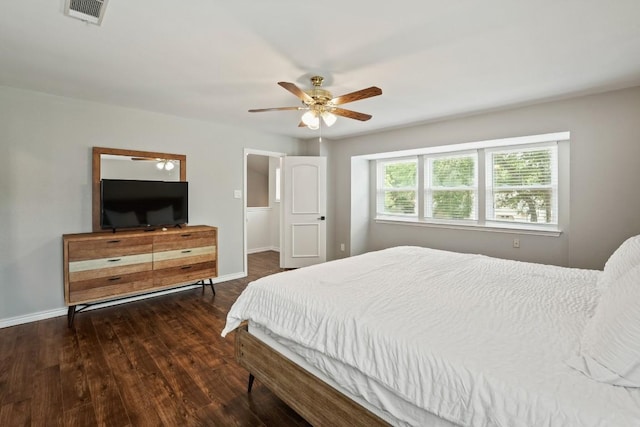 12508 Terra Nova Ln, Austin, TX 78727 - bedroom with wood finished floors, baseboards, and a ceiling fan